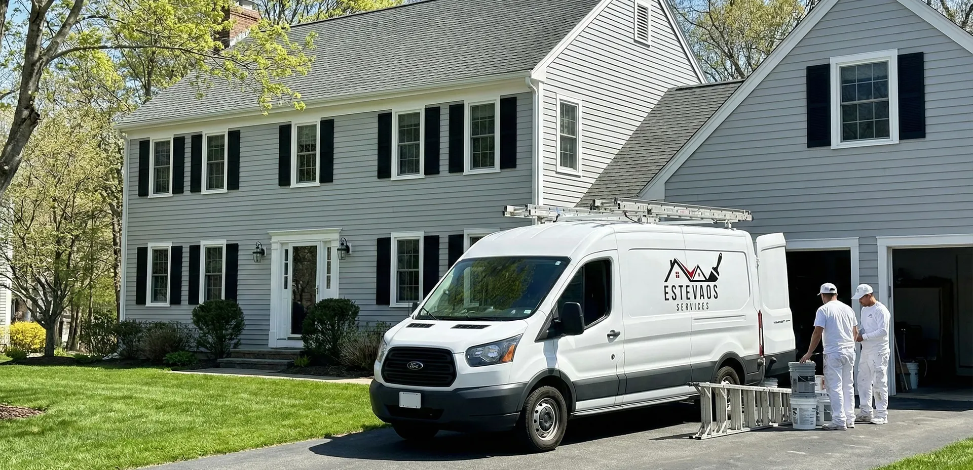A New England home with a fresh, perfect exterior paint finish